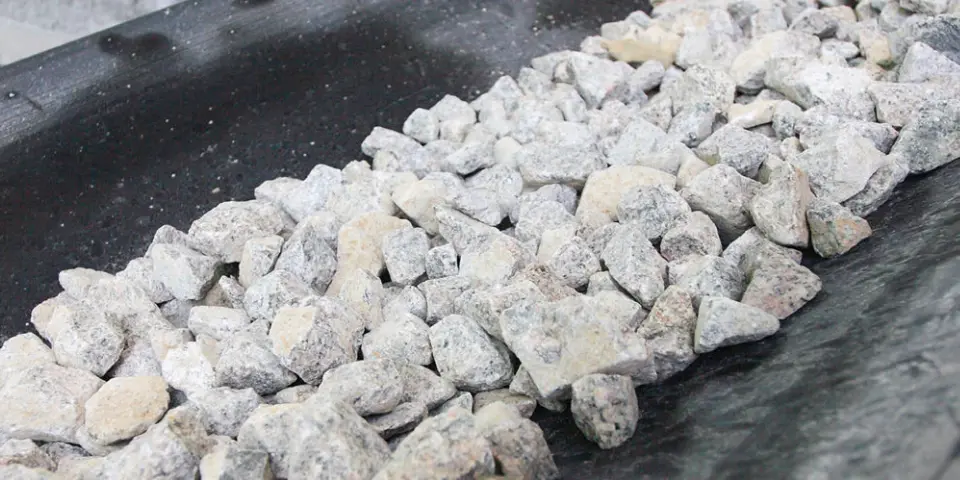 Gravel moving on conveyor belt on site