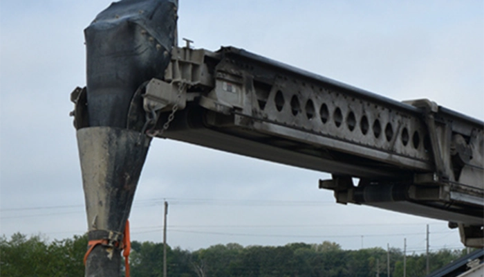 Close-up of a construction conveyor on location