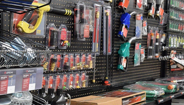 Various repair tools for sale on retail hardware store location wall