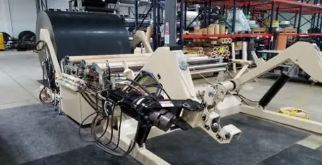 Conveyance belts being fabricated in facility