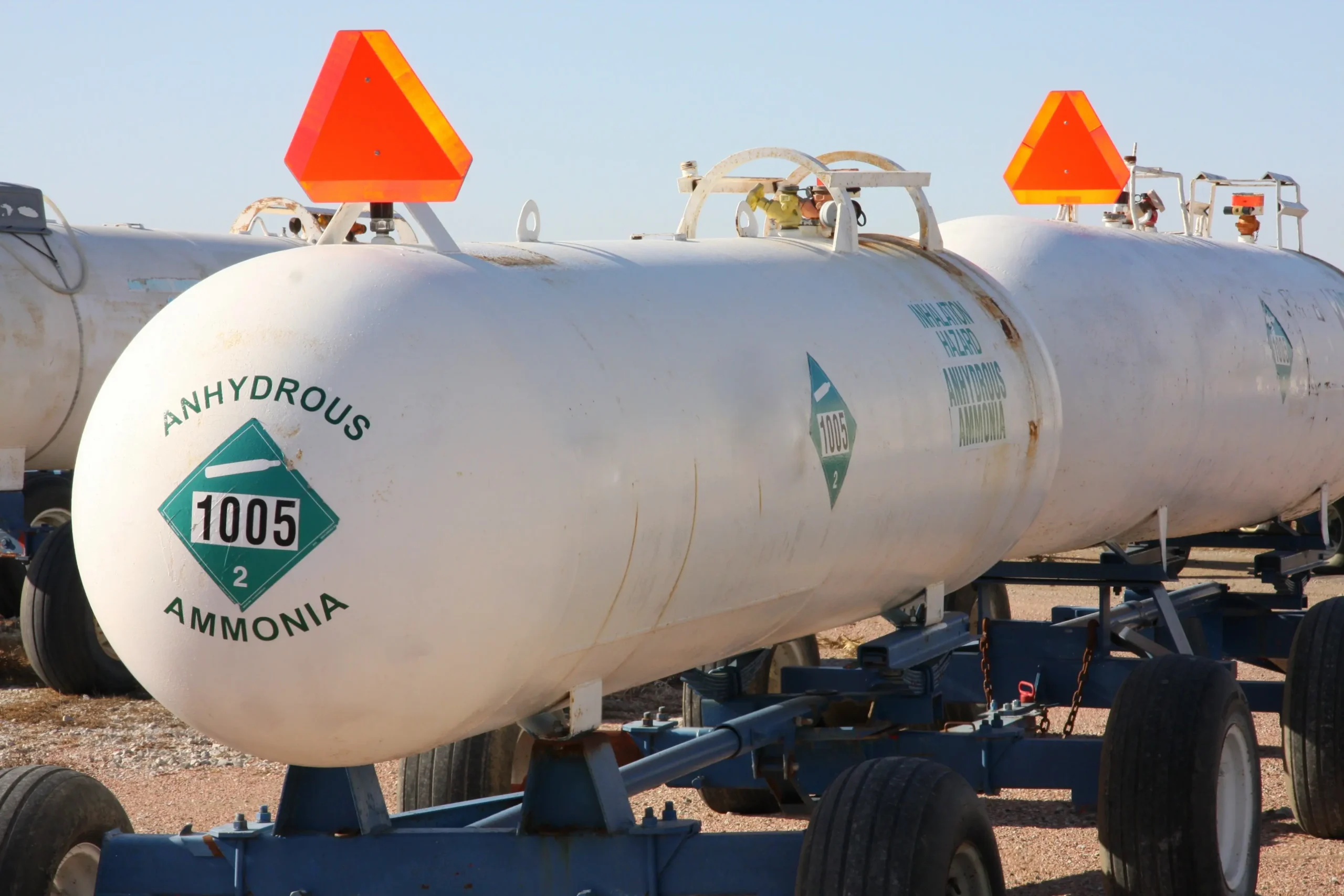 Anhydrous ammonia being applied to a corn field